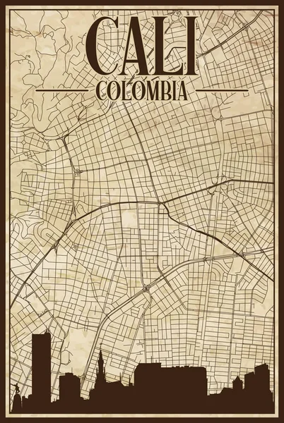 街のスカイラインとレタリングが強調されたコロンビアのダウンタウンCaliの茶色のヴィンテージ手描きのプリントアウトストリートネットワークマップ — ストックベクタ