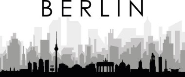 BERLIN, ALMANA 'nın arka planında gri sisli şehir binaları olan siyah şehir manzarası manzarası