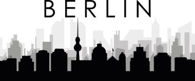 BERLIN, ALMANA 'nın arka planında gri sisli şehir binaları olan siyah şehir manzarası manzarası