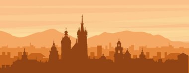 Şehrin sisli arka plan binaları, güneş doğuşu, bulutlar ve KRAKOW, POLAND dağlarının kahverengi panoramik posteri.