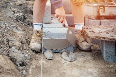 Tuğla döşeyen yüksek yoğunluklu zemin beton bloklar
