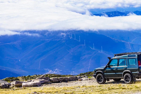 stock image Off road vehicle above clouds in mountain nature, Portugal.