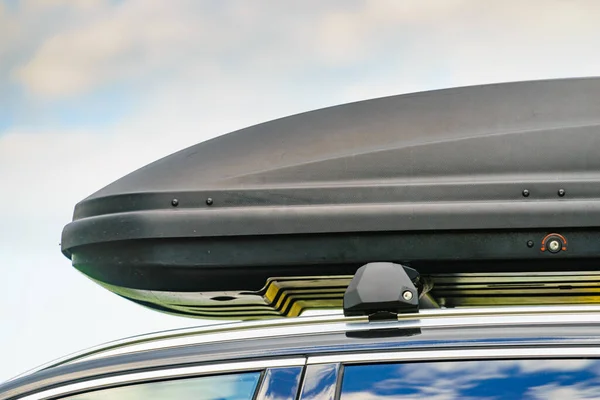 stock image Trunk or cargo box on the roof of the car. Travel, family vacation. Accessories for transportation.