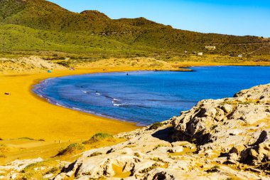 Mediterranean sea coast landscape, mountain and beach sea shore in Murcia region, Calblanque Regional Park, Spain. Tourist attraction. clipart