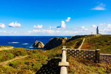 Sea coast landscape with fog horns. Cabo Penas in north Spain, Bay of Biscay. Seascape of Atlantic ocean and Asturias coastline.