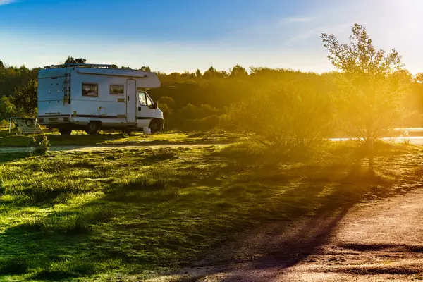 stock image Camper vehicle camping on nature. Povoa e Meadas Dam in Castelo de Vide, Alentejo Portugal. Travel in motor home.