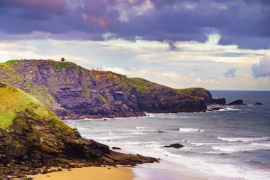 Carniciega beach on Asturias coast. Autumn seaside landscape in northern Spain. clipart