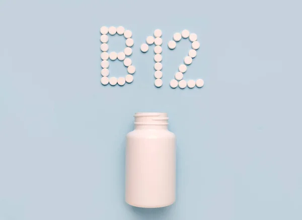 Vitamin B12, Cobalamin, icon from tablets and drug bottle on blue background. Colltction of vitamin and minerals