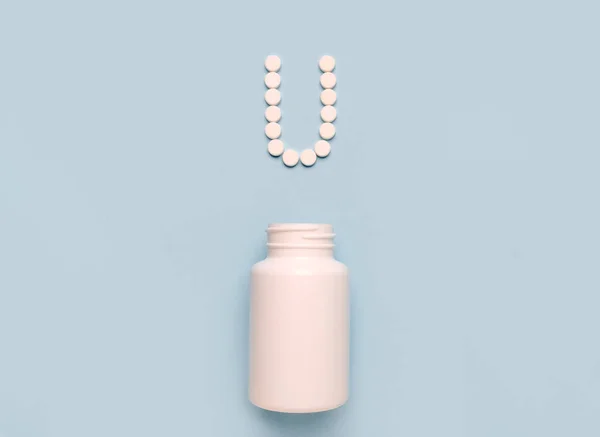 Vitamin U Methionine  icon from tablets and drug bottle on blue background. Colltction of vitamin and minerals