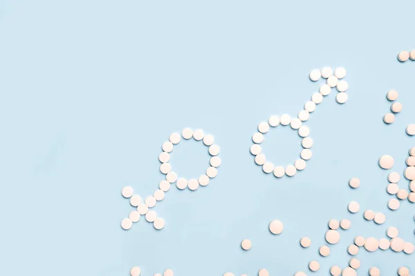 Medizinische Pillen Weiblicher Und Männlicher Symbolform Auf Hellblauem Hintergrund Konzept — Stockfoto