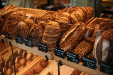 a shop window in a cafe with fragrant bread