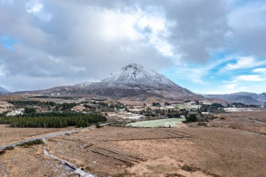 Aerial view of the snow covered Mount Errigal, the highest mountain in Donegal - Ireland