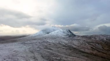 The snow covered Mount Errigal, the highest mountain in Donegal - Ireland