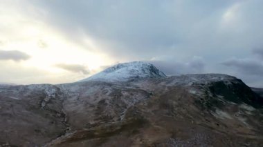 The snow covered Mount Errigal, the highest mountain in Donegal - Ireland