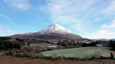 The snow covered Mount Errigal, the highest mountain in Donegal - Ireland