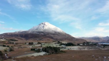 The snow covered Mount Errigal, the highest mountain in Donegal - Ireland