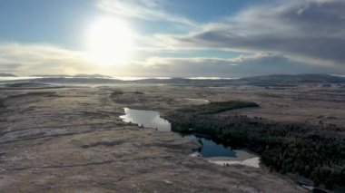 Aerial view of snow covered Lough Namanlagh by Portnoo in County Donegal, Ireland