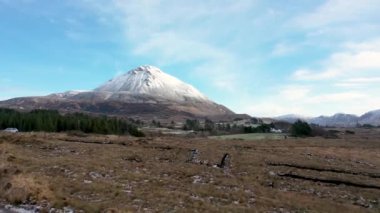 The snow covered Mount Errigal, the highest mountain in Donegal - Ireland