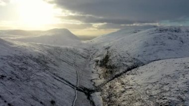 The snow covered Glenveagh Mountains and Glen in County Donegal - Republic of Ireland.