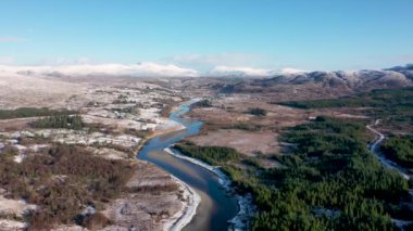 Aerial view of snow covered Gweebarra River between Doochary and Lettermacaward in Donegal - Ireland.