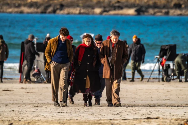 Stock image PORTNOO, COUNTY DONEGAL, IRELAND - MARCH 07 2023 : For Letters of Love is being filmed at the beach, starring Pierce Brosnan,Gabriel Byrne,Helena Bonham Carter, Fionn O Shea,Ann Skelly.