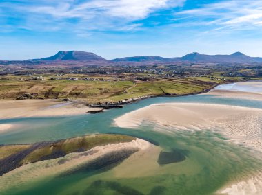 Aerial view of Ballyness Bay and Magheraroarty with the Muckish in the background in County Donegal - Ireland.