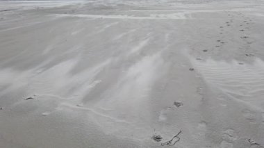 Donegal, İrlanda 'daki Lettermacaward' ın Dooey sahilinde kum fırtınası.