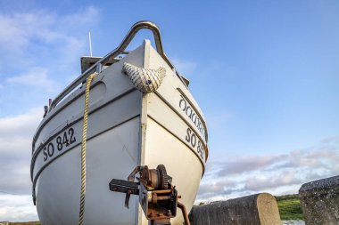 COUNTY DONEGAL, IRELAND - NOVEMBER 09 2021 : The fishing vessel is waiting on the dry dock for the next season. clipart