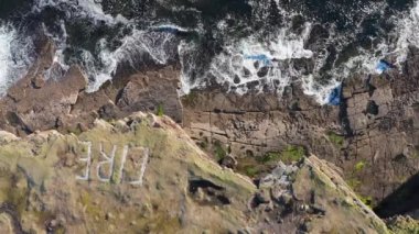 İrlanda Donegal 'deki Muckross Head' de Eire işareti