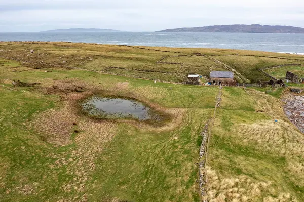 Stock image Aerial view of the Inishkeel island during a misty and hazy winter day - Portnoo, County Donegal, Ireland.