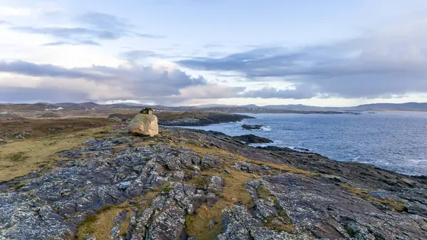 stock image Aerial view of a large stone at the beautiful coastline at Dawros in County Donegal - Ireland.