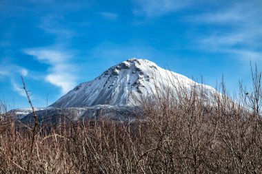 Aerial view of Mount Errigal in the winter, the highest mountain in Donegal - Ireland clipart