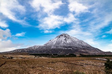 Aerial view of Mount Errigal in the winter, the highest mountain in Donegal - Ireland clipart