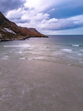 Aerial view of the beach and caves at Maghera Beach near Ardara, County Donegal - Ireland clipart