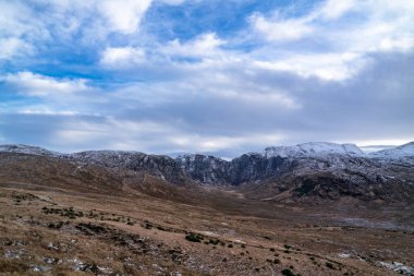 Poisen Glen next to Mount Errigal, the highest mountain in Donegal - Ireland clipart