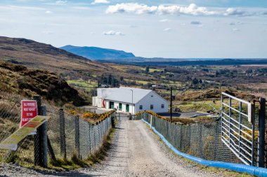 GLENTIES, IRELAND - APRIL 07 2023 : The drinking water for Ardara and Glenties is treated in Meenahalla. clipart