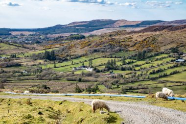 The blue water supply pipe coming from of Lough Anna, the drinking water supply for Glenties and Ardara - County Donegal, Ireland. clipart