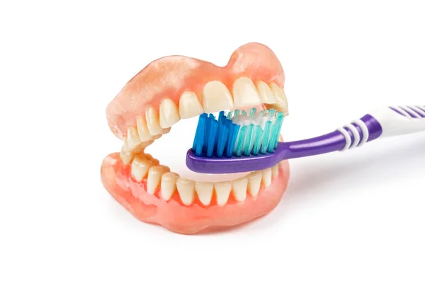 Зубы Зубной Щеткой Белом Фоне Медицинские Протезы — стоковое фото