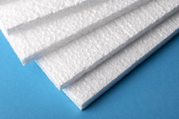 Styrofoam sheets on blue background