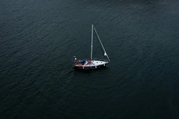 stock image Aerial view to sailing yacht in the sea