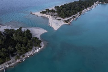 Aerial view of Glarokavos beach in Kassandra peninsula. Chalkidiki, Greece clipart