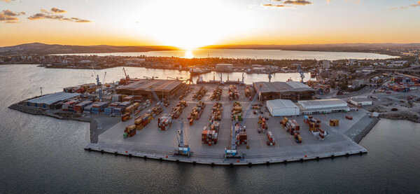 Aerial view to new container unloading terminal of port of Burgas, Bulgaria at sunset. Logistics and transport