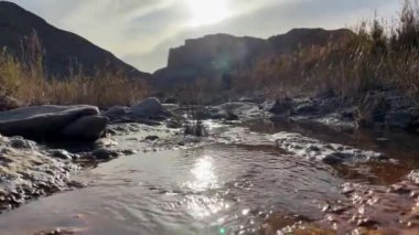 Stream of water on the bottom of  the canyon at Tabernas Desert, Andalusia, Spain,