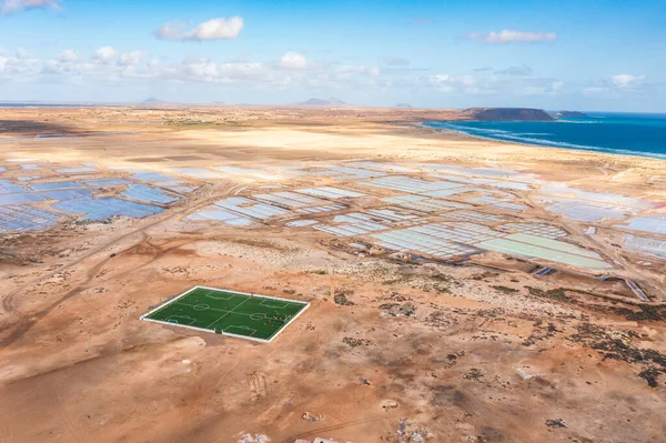 Landscape with ocean, salinas and sports field in Sal, Cape Verde Islands, Africa