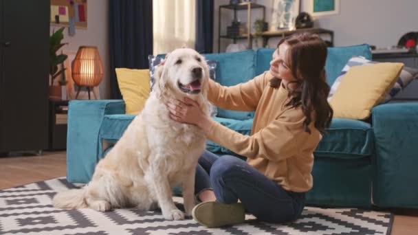 Young Caucasian Woman Her Dog Sitting Carpet Cozy Living Room — Stock Video