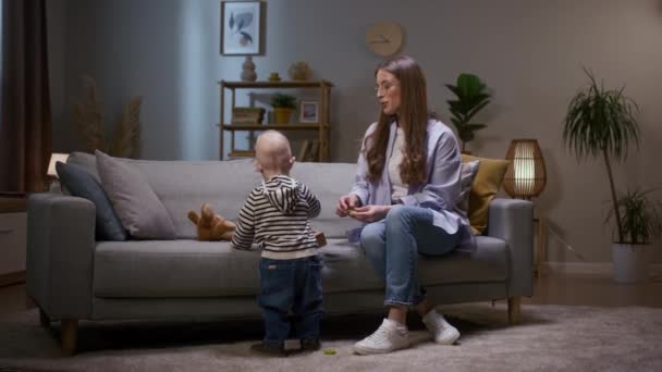 Mother Playing Little Son Woman Sitting Couch Talking Little Child — Stock Video
