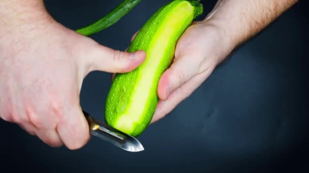 Man Peeling Vegetable Marrow Male Hands Peeling Peel Zucchini Vegetable — Stockvideo