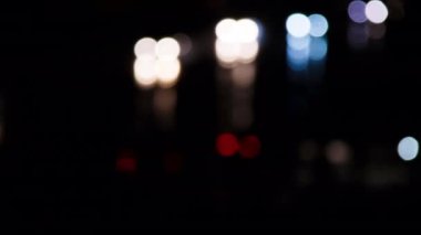 Blurred auto lights. Blurred colorful lights of cars moving fast on the freeway. Car concept of fast driving, common driving rules, road accident prevention. Traffic on city road. TV. Place for text