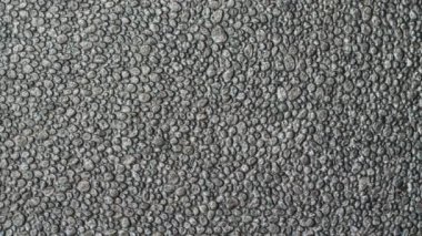 Güzel taş zemin. Ağır çekim. Soyut doku ve sanat tasarımı. Açık gri arka plan videosu. Kaldırımdaki gri kaldırım taşları. Ampul ve baloncukların makro görüntüsü. Parlak duvar kağıdı. Yakın plan.