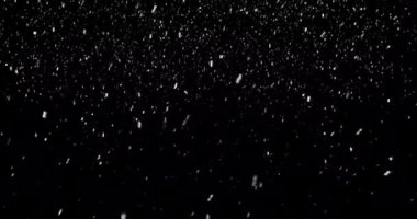 Noel 'in kara arka planında kar taneleri tepeden yağıyor, tatil